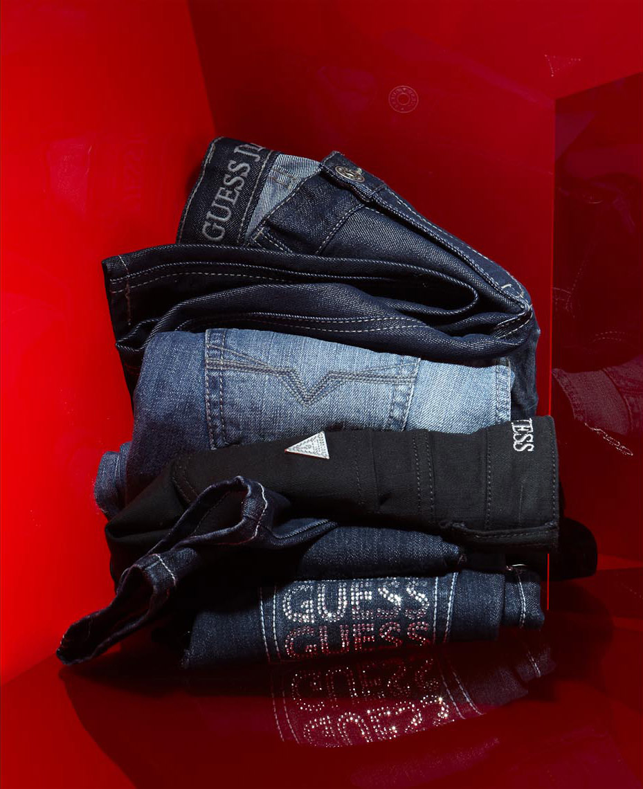Apparel Still Life, Jeans Stack on Red