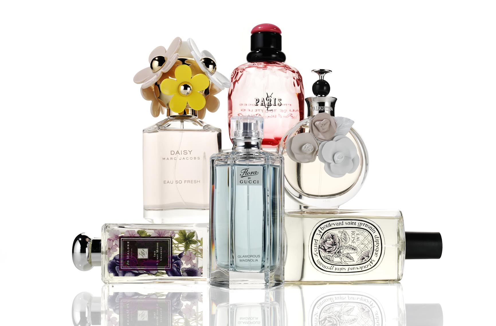Cosmetics, Fragrance Bottles Stacked on White Background - Mike Lorrig